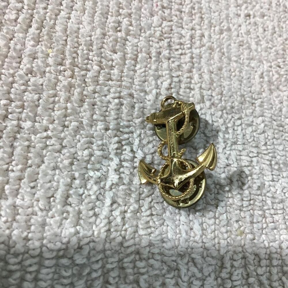 Gold military pin